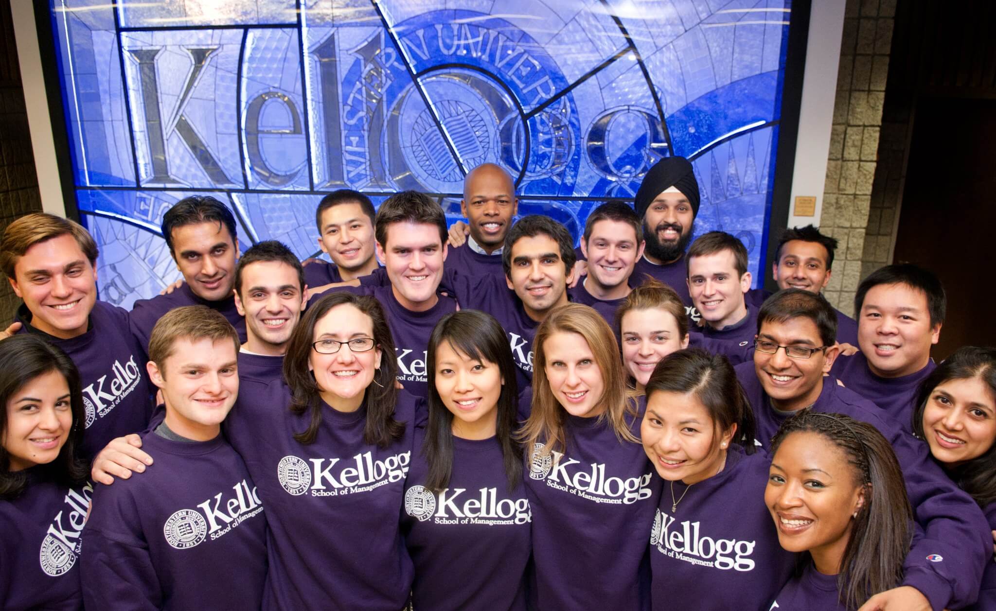 A group of students happy on campus at Kellogg School Of Management