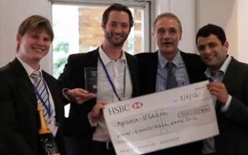 Team AgriCircle with their prize for winning the elevator pitch, l-r: Daniel Markward, Peter Fröhlich, Competition Director Jeff Skinner, and Simon Wolpert