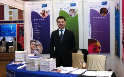 Heriot-Watt University's Zhongyi Wang at an education fair in Asia