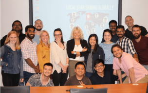 Stephanie Jones (center) leads a class on working within diverse teams at Maastricht School of Management (MSM)