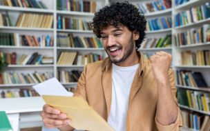 Scholarships help make business education accessible to everyone. ©Liubomyr Vorona/iStock